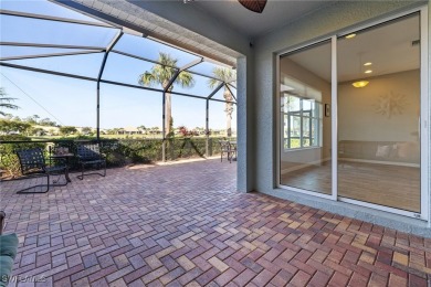 Experience the Florida lifestyle in this charming three-bedroom on Pelican Preserve Golf Club in Florida - for sale on GolfHomes.com, golf home, golf lot