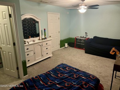 This large and unique home is a must see! It has a huge private on King and Bear Golf Course/World Golf Village in Florida - for sale on GolfHomes.com, golf home, golf lot