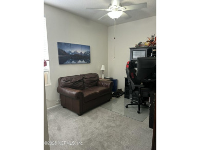 This large and unique home is a must see! It has a huge private on King and Bear Golf Course/World Golf Village in Florida - for sale on GolfHomes.com, golf home, golf lot