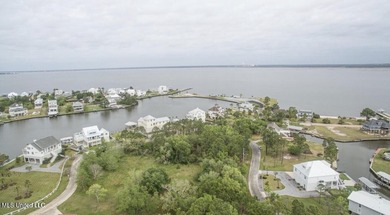 Great lot in Timber Ridge Shores that is high and dry with views on Pass Christian Isles Golf Club in Mississippi - for sale on GolfHomes.com, golf home, golf lot