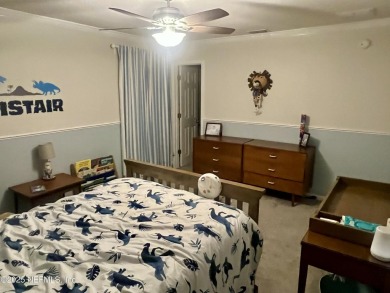 This large and unique home is a must see! It has a huge private on King and Bear Golf Course/World Golf Village in Florida - for sale on GolfHomes.com, golf home, golf lot
