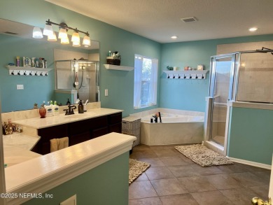 This large and unique home is a must see! It has a huge private on King and Bear Golf Course/World Golf Village in Florida - for sale on GolfHomes.com, golf home, golf lot