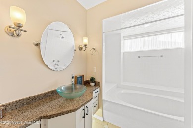 Experience peaceful comfort and style in one of the most on Suntree Country Club in Florida - for sale on GolfHomes.com, golf home, golf lot