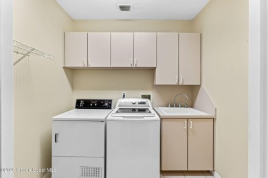 Experience peaceful comfort and style in one of the most on Suntree Country Club in Florida - for sale on GolfHomes.com, golf home, golf lot