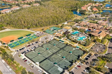 Experience the Florida lifestyle in this charming three-bedroom on Pelican Preserve Golf Club in Florida - for sale on GolfHomes.com, golf home, golf lot