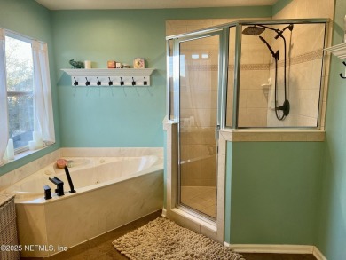 This large and unique home is a must see! It has a huge private on King and Bear Golf Course/World Golf Village in Florida - for sale on GolfHomes.com, golf home, golf lot