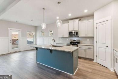 Beautiful Ranch-Style Home in the Tranquil Golf Course Community on Traditions of Braselton Golf Club in Georgia - for sale on GolfHomes.com, golf home, golf lot