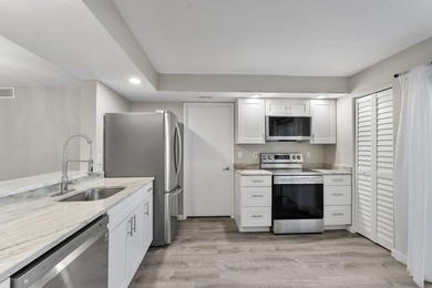 Beautifully updated 2-bedroom, 2-bathroom condo in Boca Pointe's on Boca Pointe Country Club in Florida - for sale on GolfHomes.com, golf home, golf lot