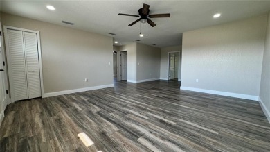 Welcome to this beautifully updated 3-bedroom, 1-bath on North Lakes Golf Course in Florida - for sale on GolfHomes.com, golf home, golf lot
