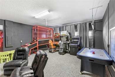 This VACATION HOME CHECKS ALL THE BOXES YOU'VE BEEN LOOKING FOR! on The Oasis Club at Champions Gate in Florida - for sale on GolfHomes.com, golf home, golf lot
