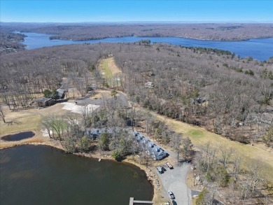 Unbeatable location nestled directly between the tranquil shores on Paupack Hills Golf and Country Club in Pennsylvania - for sale on GolfHomes.com, golf home, golf lot