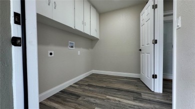 Welcome to this beautifully updated 3-bedroom, 1-bath on North Lakes Golf Course in Florida - for sale on GolfHomes.com, golf home, golf lot