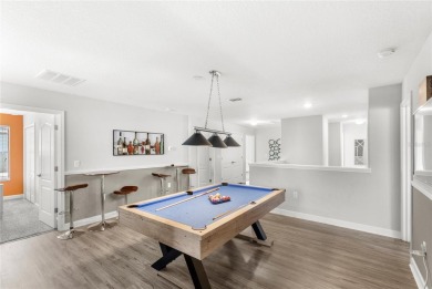 This VACATION HOME CHECKS ALL THE BOXES YOU'VE BEEN LOOKING FOR! on The Oasis Club at Champions Gate in Florida - for sale on GolfHomes.com, golf home, golf lot