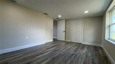 Welcome to this beautifully updated 3-bedroom, 1-bath on North Lakes Golf Course in Florida - for sale on GolfHomes.com, golf home, golf lot
