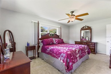 Don't Miss This Canal-Front Charmer!  Located in the desirable on Indian Lake Estates Golf and Country Club in Florida - for sale on GolfHomes.com, golf home, golf lot