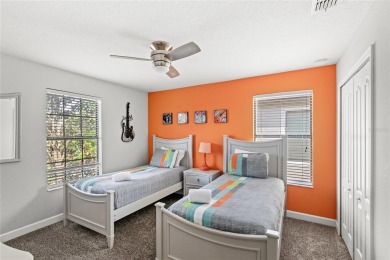 This VACATION HOME CHECKS ALL THE BOXES YOU'VE BEEN LOOKING FOR! on The Oasis Club at Champions Gate in Florida - for sale on GolfHomes.com, golf home, golf lot
