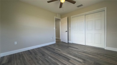 Welcome to this beautifully updated 3-bedroom, 1-bath on North Lakes Golf Course in Florida - for sale on GolfHomes.com, golf home, golf lot