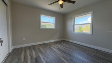 Welcome to this beautifully updated 3-bedroom, 1-bath on North Lakes Golf Course in Florida - for sale on GolfHomes.com, golf home, golf lot