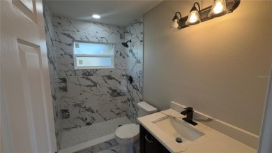 Welcome to this beautifully updated 3-bedroom, 1-bath on North Lakes Golf Course in Florida - for sale on GolfHomes.com, golf home, golf lot