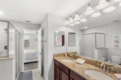 This VACATION HOME CHECKS ALL THE BOXES YOU'VE BEEN LOOKING FOR! on The Oasis Club at Champions Gate in Florida - for sale on GolfHomes.com, golf home, golf lot