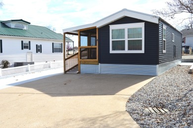 This is a beautifully renovated, from top to bottom, Tiny home on Pointe Royale Village Country Club in Missouri - for sale on GolfHomes.com, golf home, golf lot