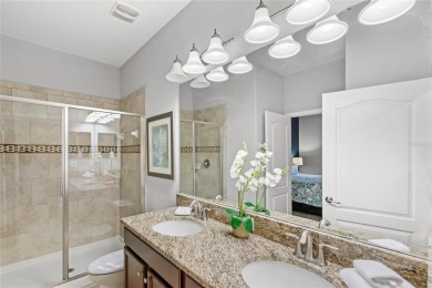 This VACATION HOME CHECKS ALL THE BOXES YOU'VE BEEN LOOKING FOR! on The Oasis Club at Champions Gate in Florida - for sale on GolfHomes.com, golf home, golf lot