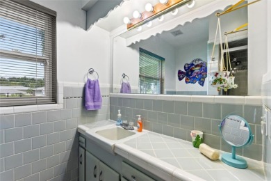 Don't Miss This Canal-Front Charmer!  Located in the desirable on Indian Lake Estates Golf and Country Club in Florida - for sale on GolfHomes.com, golf home, golf lot