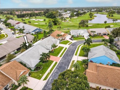 Vaulted ceilings and streaming natural light welcome you into on The Golf Club of Jupiter in Florida - for sale on GolfHomes.com, golf home, golf lot