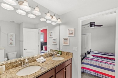 This VACATION HOME CHECKS ALL THE BOXES YOU'VE BEEN LOOKING FOR! on The Oasis Club at Champions Gate in Florida - for sale on GolfHomes.com, golf home, golf lot