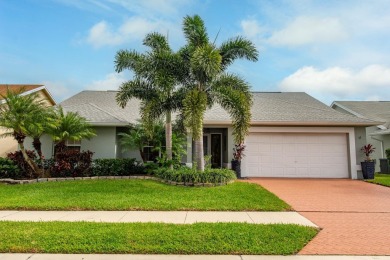 Vaulted ceilings and streaming natural light welcome you into on The Golf Club of Jupiter in Florida - for sale on GolfHomes.com, golf home, golf lot