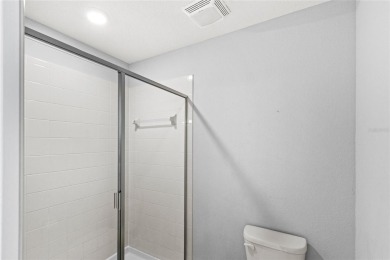 This VACATION HOME CHECKS ALL THE BOXES YOU'VE BEEN LOOKING FOR! on The Oasis Club at Champions Gate in Florida - for sale on GolfHomes.com, golf home, golf lot