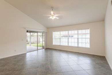 Vaulted ceilings and streaming natural light welcome you into on The Golf Club of Jupiter in Florida - for sale on GolfHomes.com, golf home, golf lot