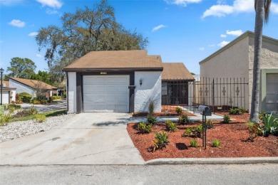 Beautifully Remodeled Corner Lot Home in Beacon Woods Golf on Beacon Woods Golf Club in Florida - for sale on GolfHomes.com, golf home, golf lot