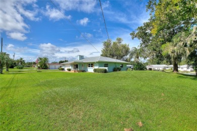 Don't Miss This Canal-Front Charmer!  Located in the desirable on Indian Lake Estates Golf and Country Club in Florida - for sale on GolfHomes.com, golf home, golf lot
