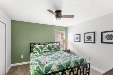 This VACATION HOME CHECKS ALL THE BOXES YOU'VE BEEN LOOKING FOR! on The Oasis Club at Champions Gate in Florida - for sale on GolfHomes.com, golf home, golf lot