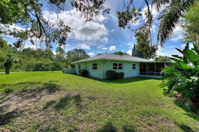 Don't Miss This Canal-Front Charmer!  Located in the desirable on Indian Lake Estates Golf and Country Club in Florida - for sale on GolfHomes.com, golf home, golf lot