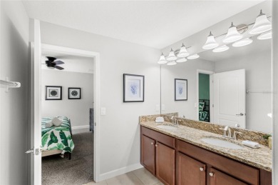 This VACATION HOME CHECKS ALL THE BOXES YOU'VE BEEN LOOKING FOR! on The Oasis Club at Champions Gate in Florida - for sale on GolfHomes.com, golf home, golf lot