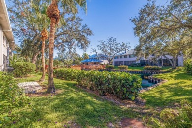 Discover this delightful 2 bedroom + den, 2.5 bath, 1 car on Mangrove Bay Golf Course in Florida - for sale on GolfHomes.com, golf home, golf lot