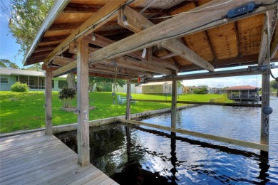 Don't Miss This Canal-Front Charmer!  Located in the desirable on Indian Lake Estates Golf and Country Club in Florida - for sale on GolfHomes.com, golf home, golf lot