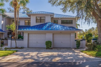 Discover this delightful 2 bedroom + den, 2.5 bath, 1 car on Mangrove Bay Golf Course in Florida - for sale on GolfHomes.com, golf home, golf lot