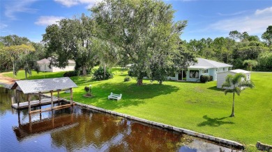 Don't Miss This Canal-Front Charmer!  Located in the desirable on Indian Lake Estates Golf and Country Club in Florida - for sale on GolfHomes.com, golf home, golf lot
