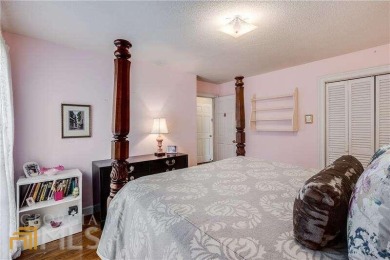 Prestigious neighborhood near golf club, dining, tennis, and more on Chattahoochee Golf Course in Georgia - for sale on GolfHomes.com, golf home, golf lot