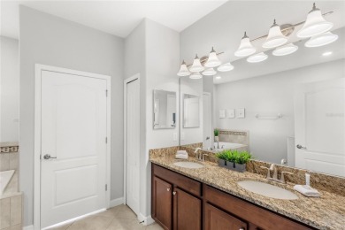 This VACATION HOME CHECKS ALL THE BOXES YOU'VE BEEN LOOKING FOR! on The Oasis Club at Champions Gate in Florida - for sale on GolfHomes.com, golf home, golf lot