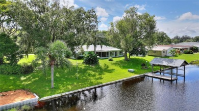 Don't Miss This Canal-Front Charmer!  Located in the desirable on Indian Lake Estates Golf and Country Club in Florida - for sale on GolfHomes.com, golf home, golf lot