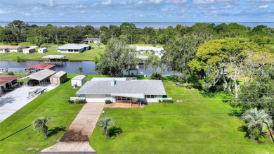 Don't Miss This Canal-Front Charmer!  Located in the desirable on Indian Lake Estates Golf and Country Club in Florida - for sale on GolfHomes.com, golf home, golf lot