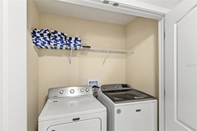 This VACATION HOME CHECKS ALL THE BOXES YOU'VE BEEN LOOKING FOR! on The Oasis Club at Champions Gate in Florida - for sale on GolfHomes.com, golf home, golf lot