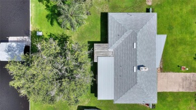 Don't Miss This Canal-Front Charmer!  Located in the desirable on Indian Lake Estates Golf and Country Club in Florida - for sale on GolfHomes.com, golf home, golf lot