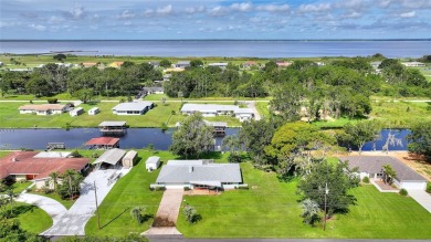 Don't Miss This Canal-Front Charmer!  Located in the desirable on Indian Lake Estates Golf and Country Club in Florida - for sale on GolfHomes.com, golf home, golf lot