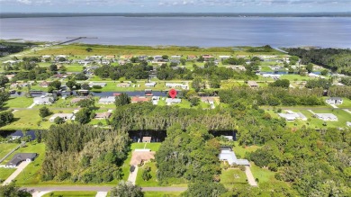 Don't Miss This Canal-Front Charmer!  Located in the desirable on Indian Lake Estates Golf and Country Club in Florida - for sale on GolfHomes.com, golf home, golf lot