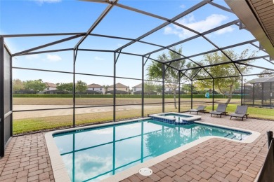 This VACATION HOME CHECKS ALL THE BOXES YOU'VE BEEN LOOKING FOR! on The Oasis Club at Champions Gate in Florida - for sale on GolfHomes.com, golf home, golf lot